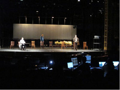 A dark theatre during technical rehearsal