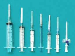 blue background syringes