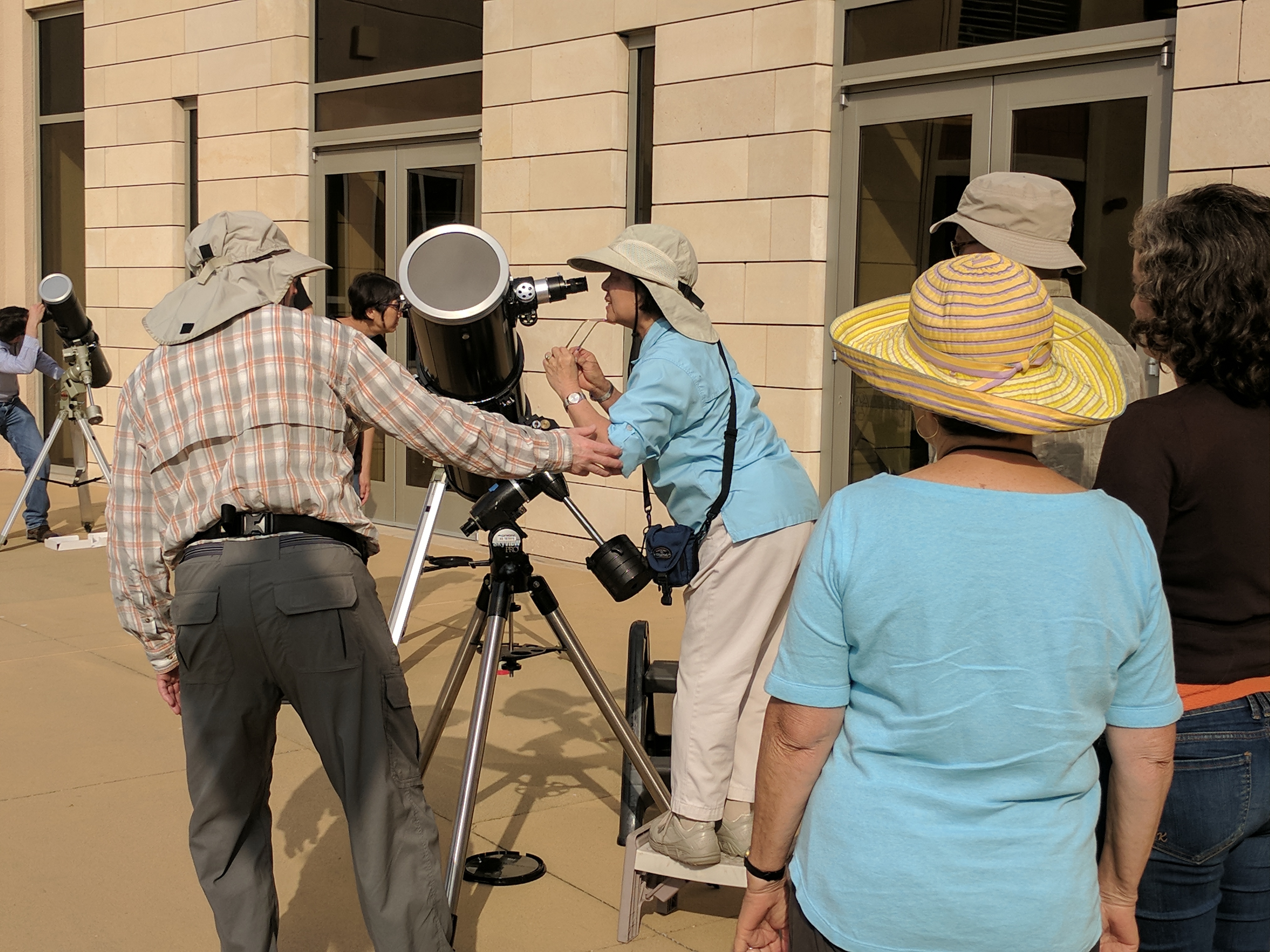 Solar eclipse viewing with SCU's telescopes and solar filters.