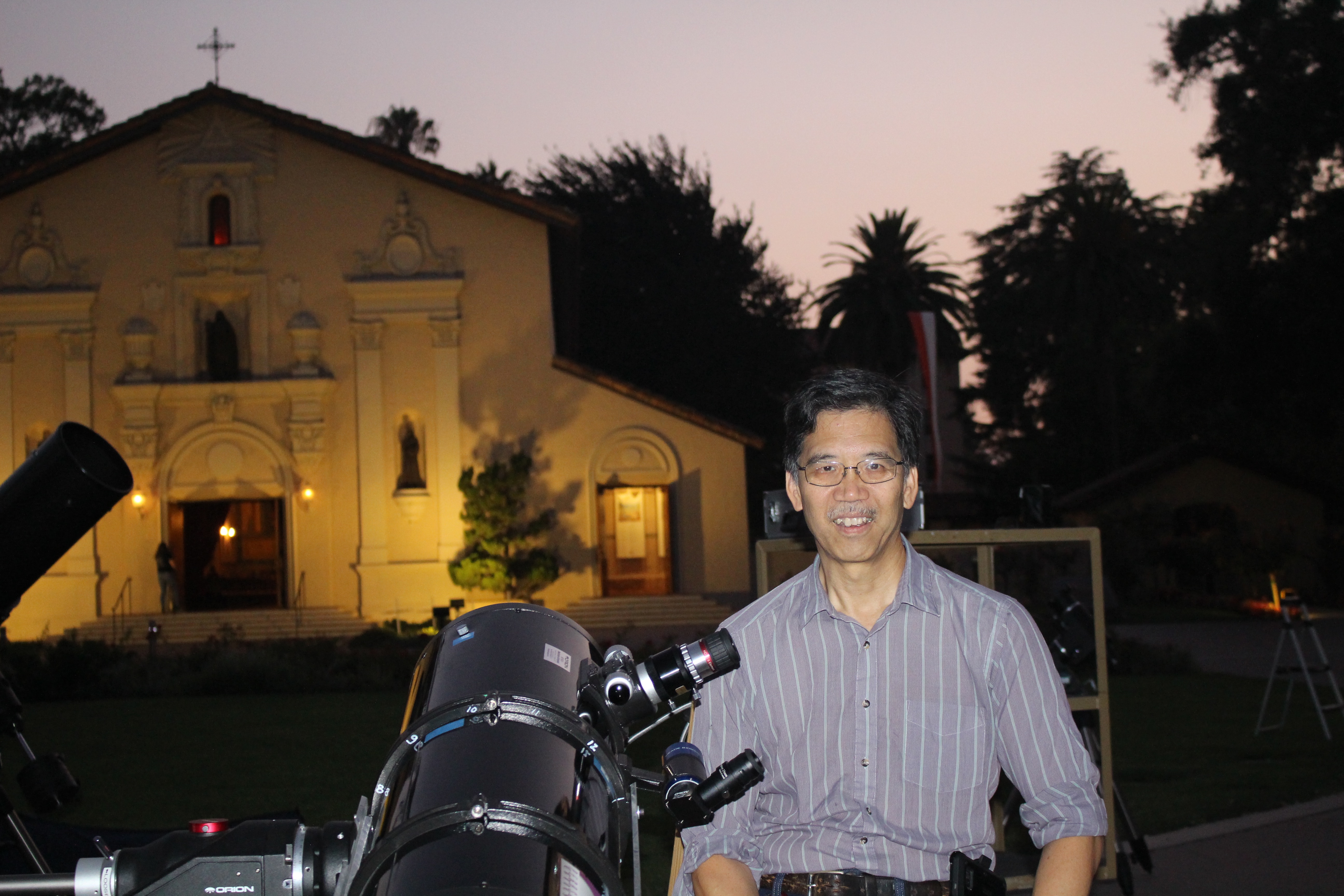 Volunterr Willis Dair with his telescope at the event.
