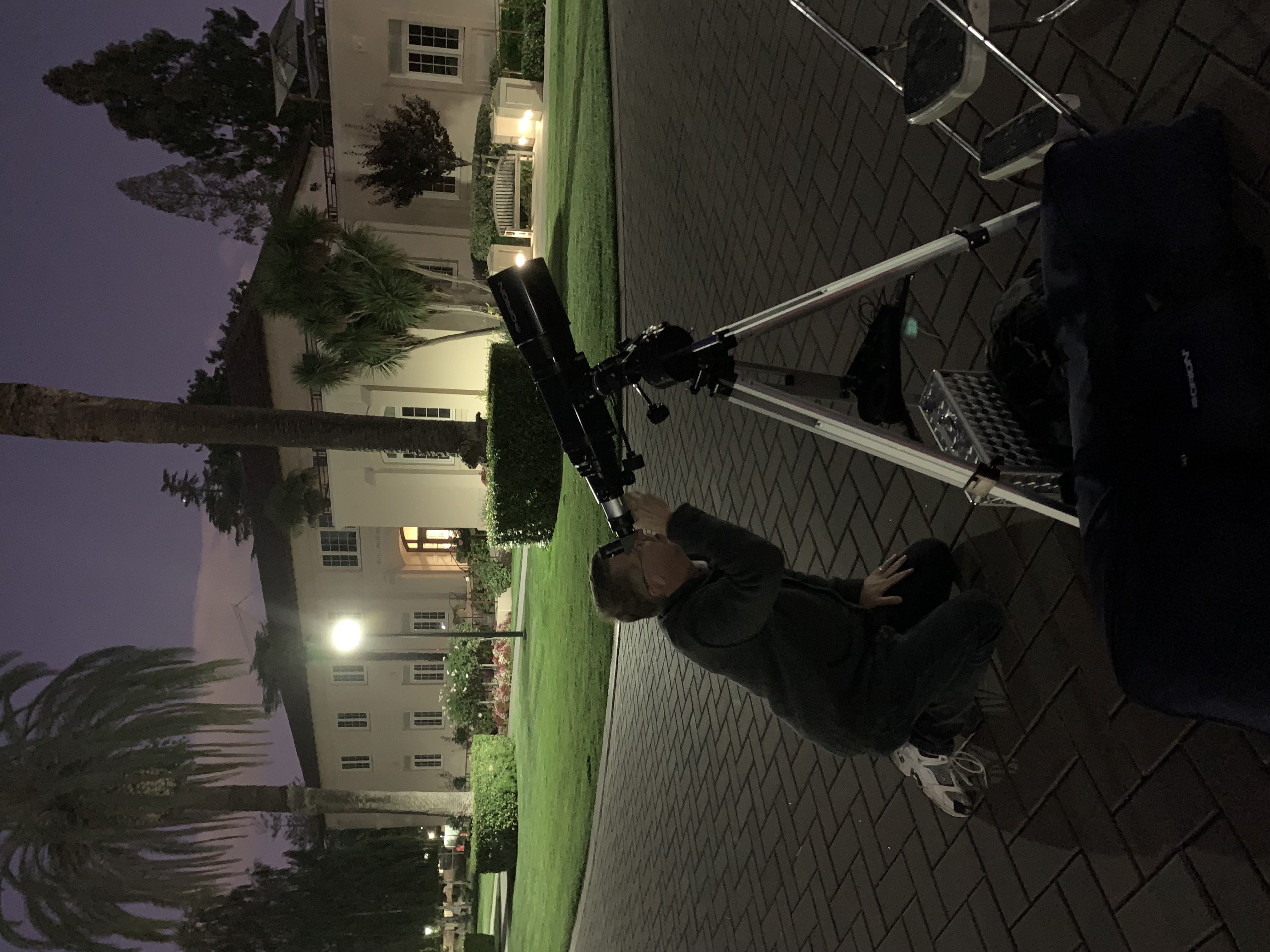 Volunteer Steven Marcus aligning his telescope.