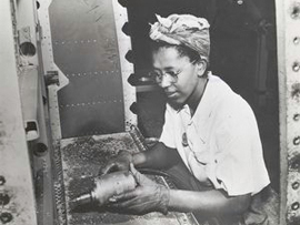 African American Working in a Factory